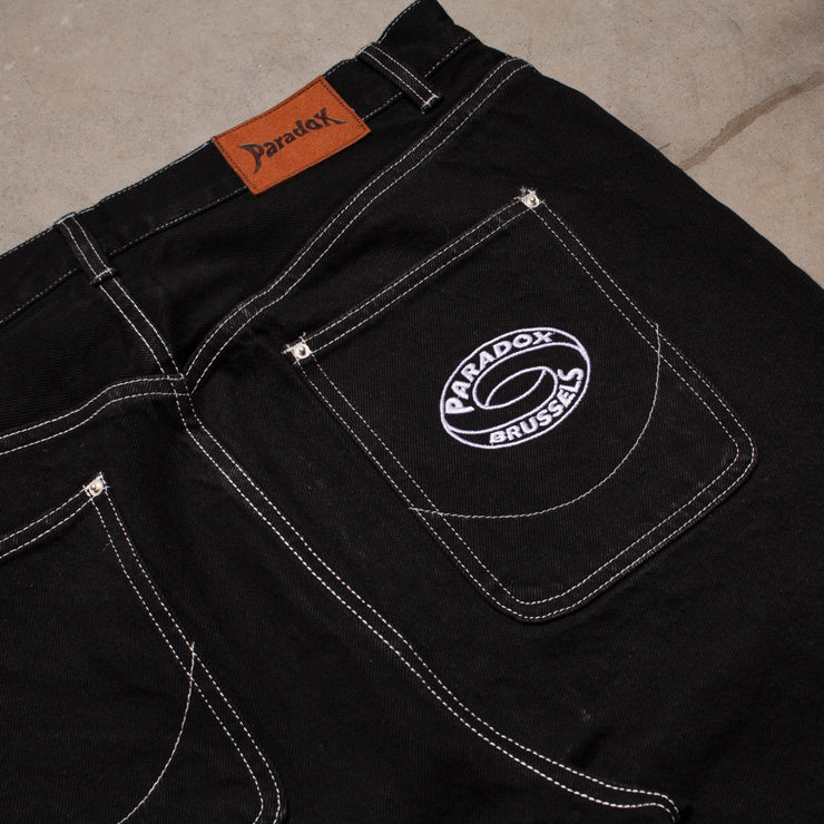 black denim trousers ; denim trousers men ; black trousers ; embroidered pocket ; suede patch